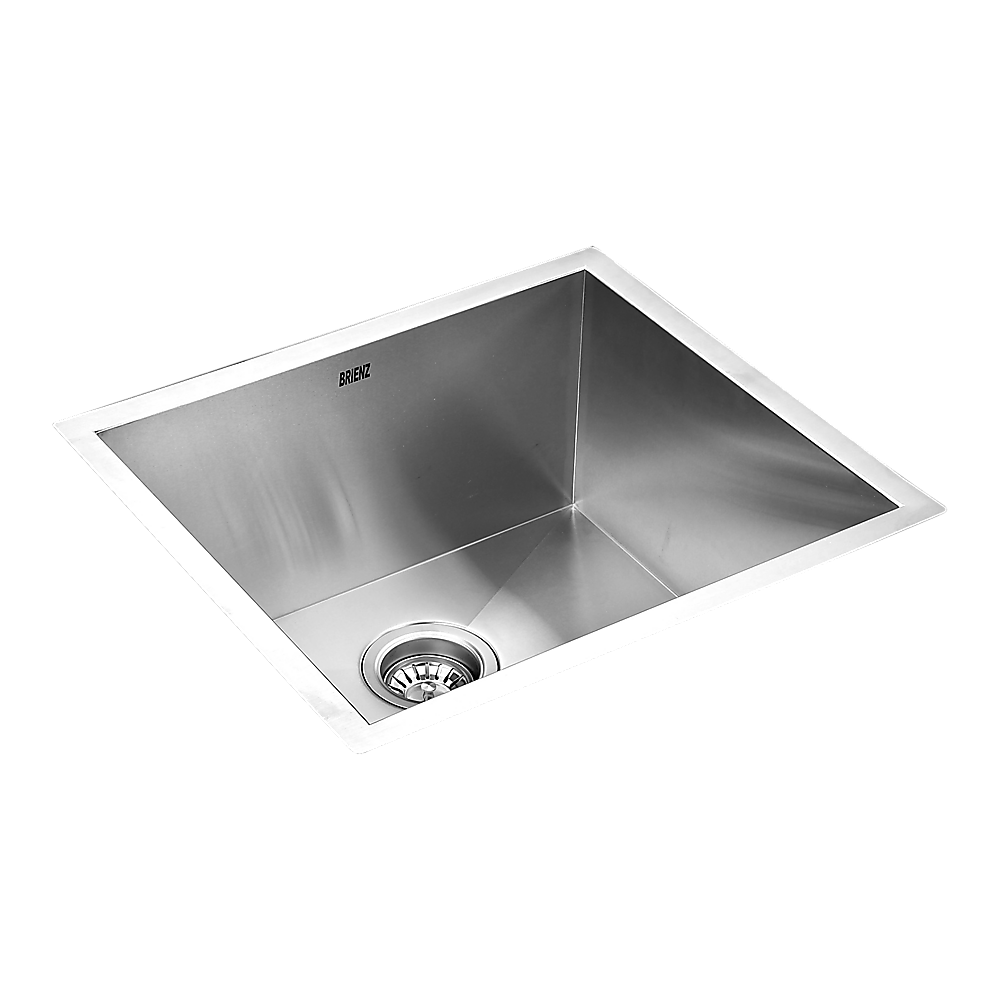 Stainless steel single-bowl sink with round drain, viewed from above
