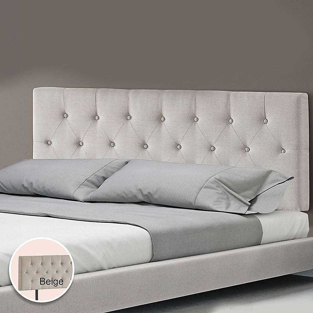 Beige linen queen headboard with button-tufted diamond pattern, shown above the bed