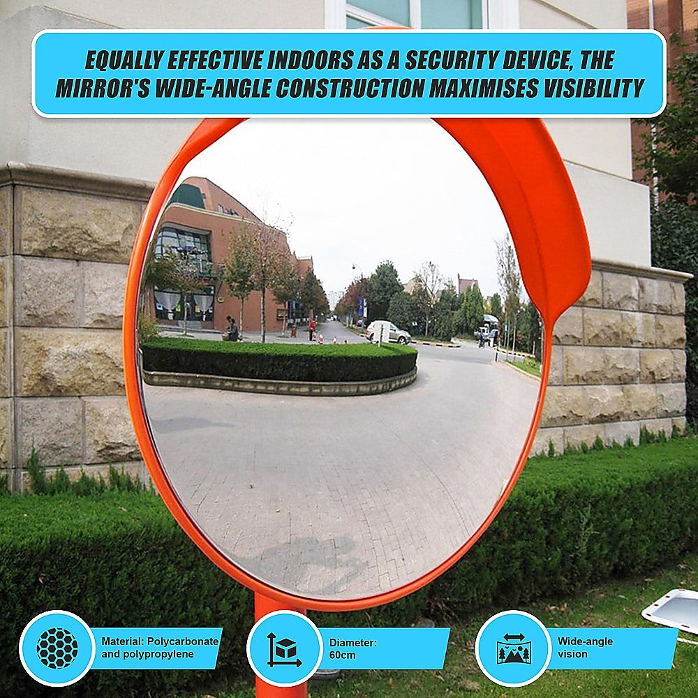 Round convex safety mirror with bright orange frame mounted on pole