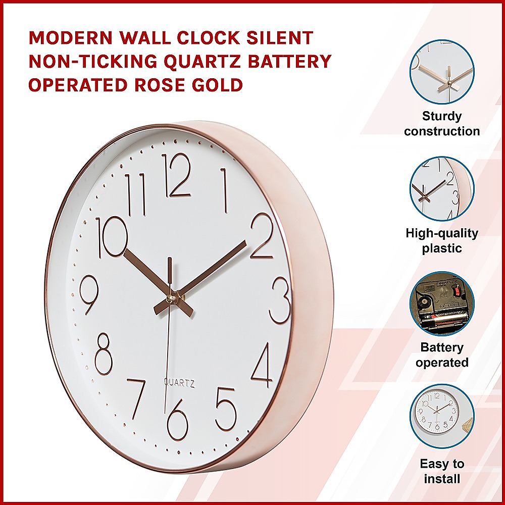 Rose gold and white wall clock with roman numerals, metal hands, and dot minute markers