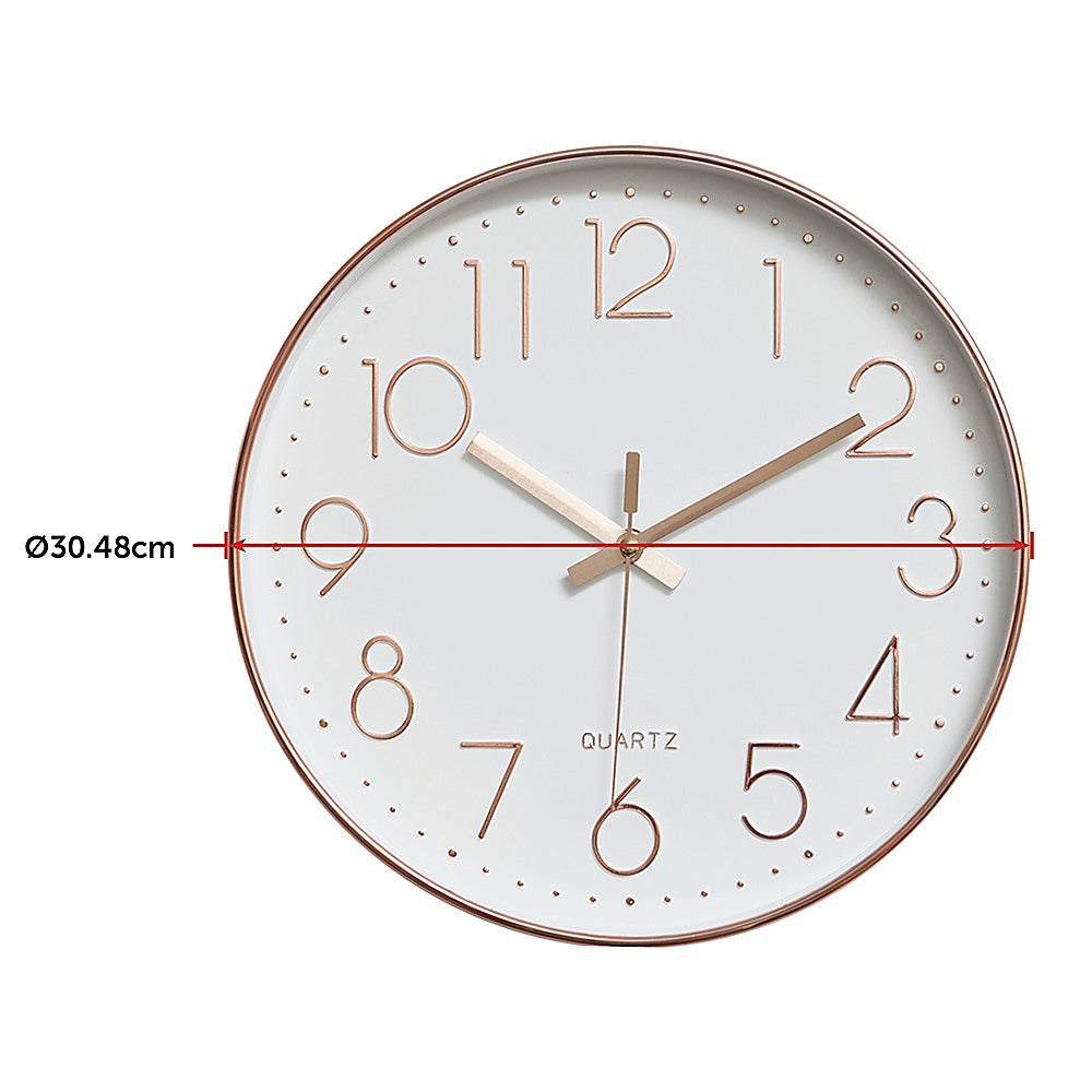 Rose gold and white wall clock showing Ø30.48cm, roman numerals, and gold hands