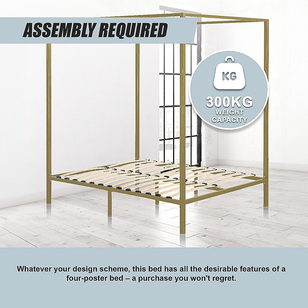 Four-poster double bed frame with gold rails and slatted support platform