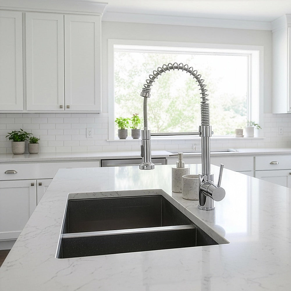 Kitchen sink faucet with extendable spring pull-down sprayer, chrome
