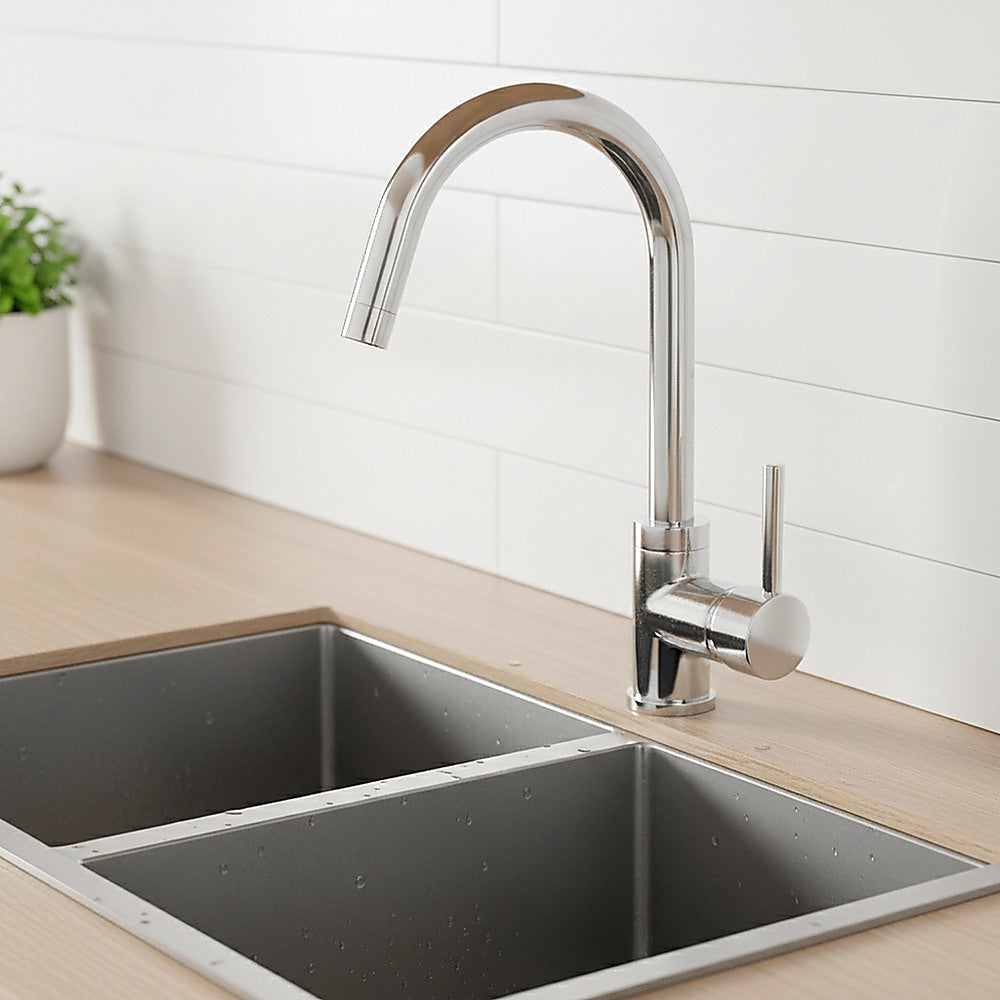 Stainless steel kitchen mixer tap faucet with single lever over rectangular sink basin