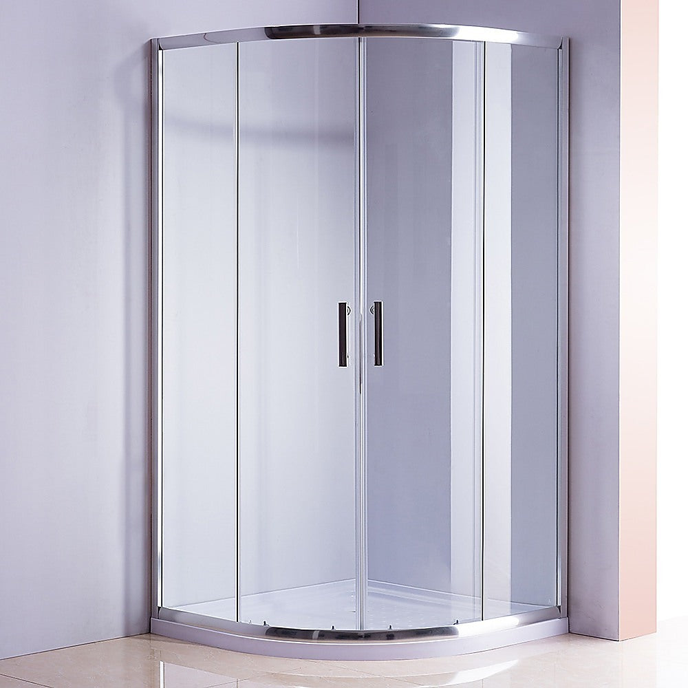 Rounded sliding shower enclosure with clear glass panels, chrome frame, and curved base