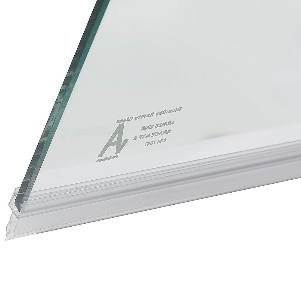 Close-up of clear safety glass panel edge with chrome side profile
