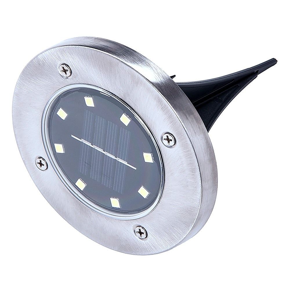 Close-up of stainless solar LED inground light lens with black stake