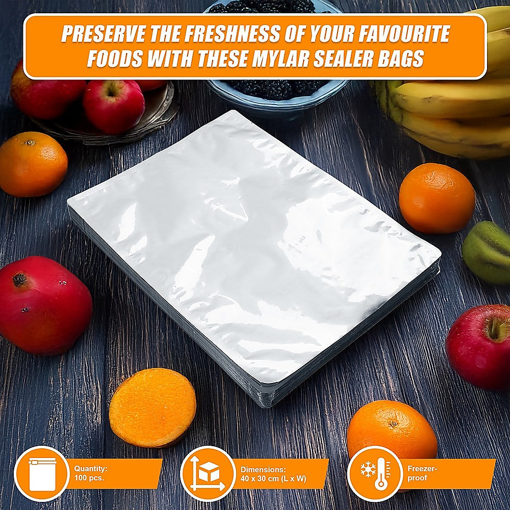 Silver vacuum storage bag pouch, flat folded, heat-seal style edge at center.