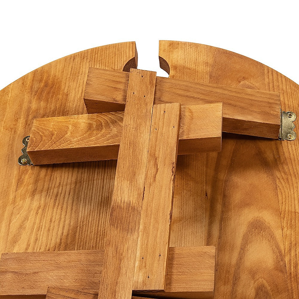 Wooden folding wine rack picnic table with cross brace and metal hinge near tray edge