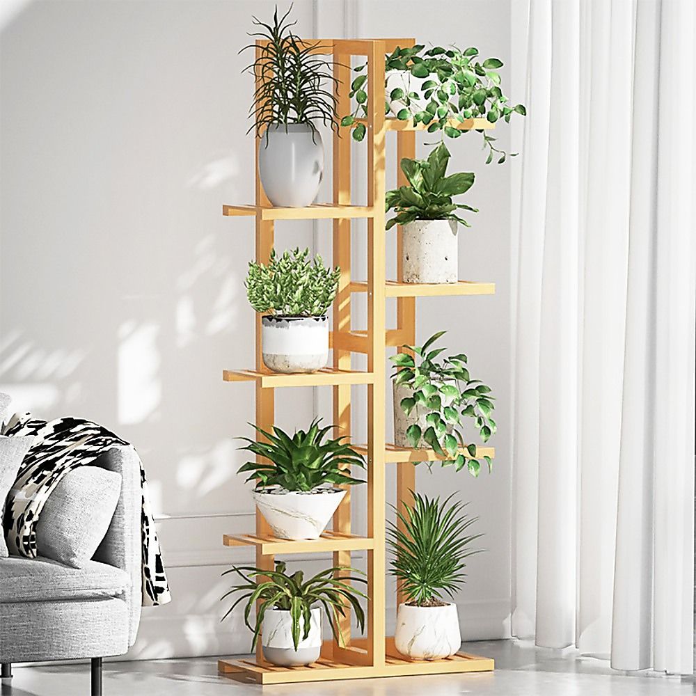 Vertical bamboo plant stand with six open shelves for displaying potted plants