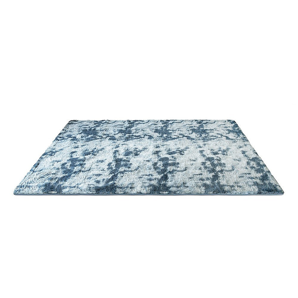 Blue shaggy area rug, large rectangular shape