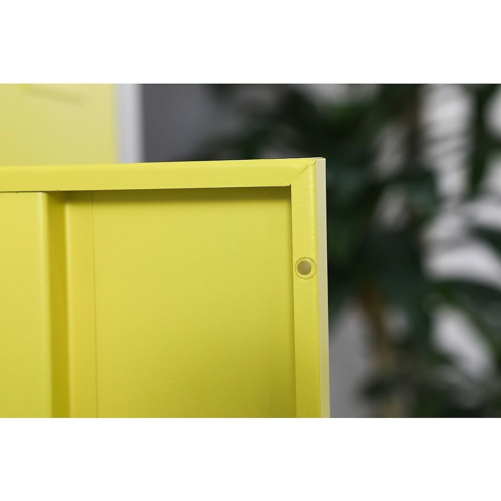 Yellow locker door with keyhole cylinder on side edge
