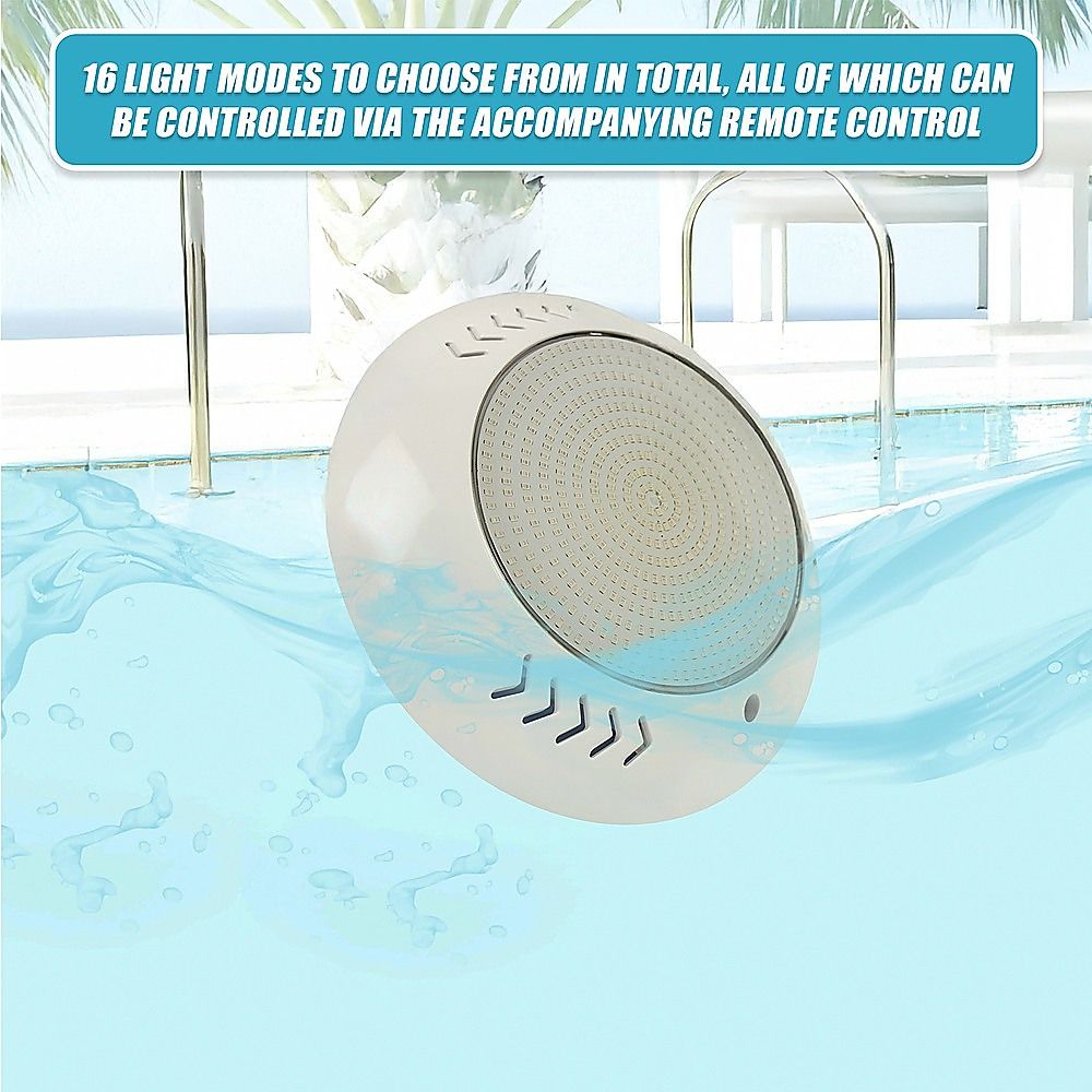 Round white LED pool light under water with circular lens and directional markings