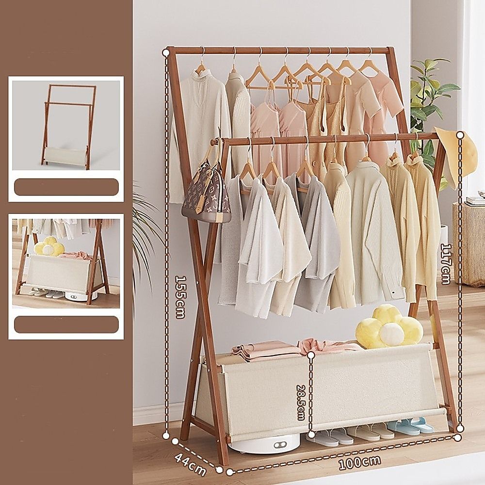 Dark wood clothes rail with hanging garments and lower fold-out storage shelf