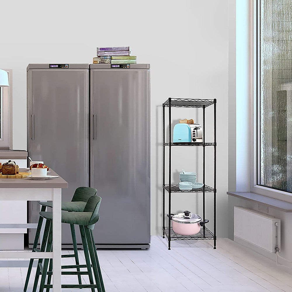 Black four-tier wire shelving rack with open frame, holding small kitchen items.