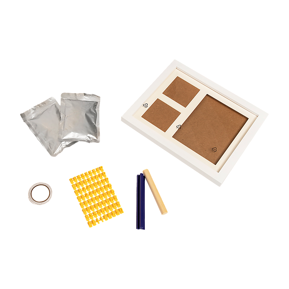 Hand and foot print clay cast kit components with white photo frame inserts