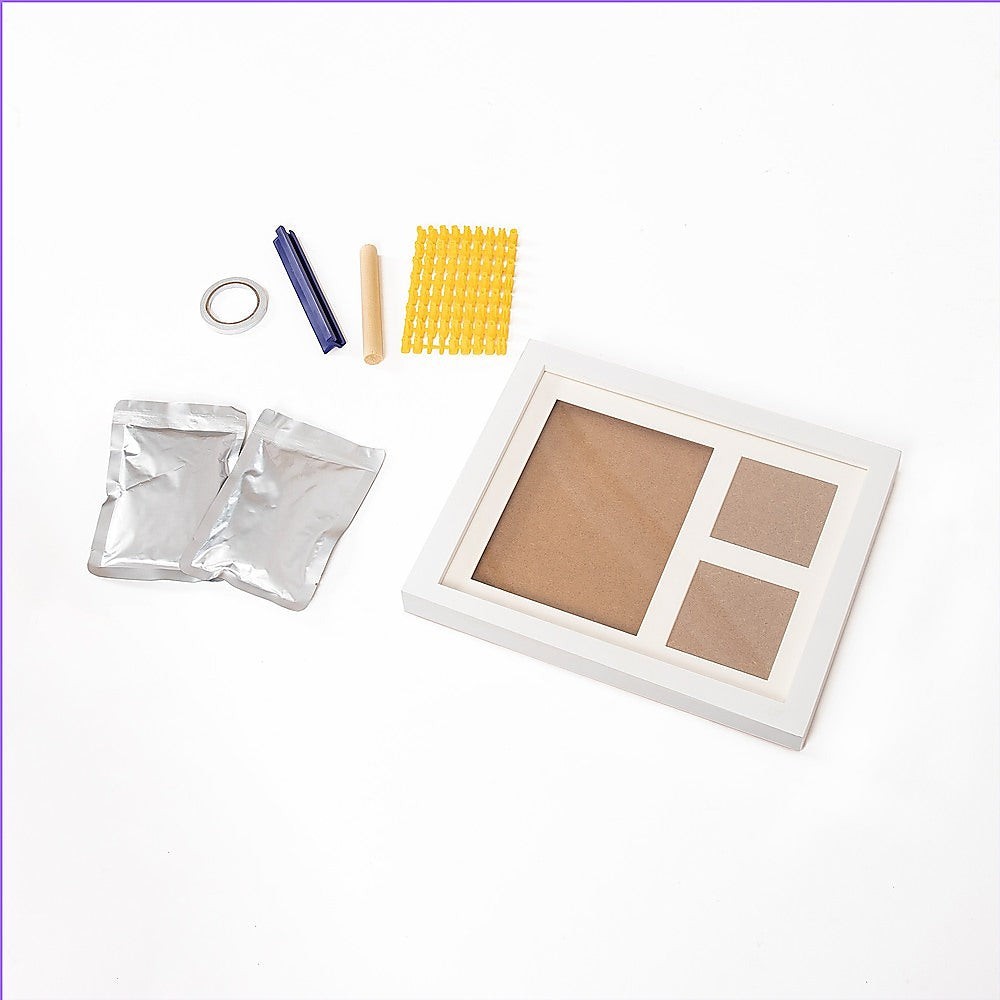 Clay cast kit accessories with white frame base, yellow mesh block and modeling tools