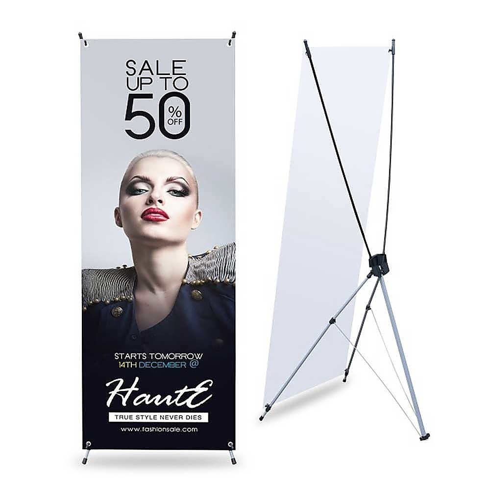 X banner stand with hanging banner and four snap fasteners on base