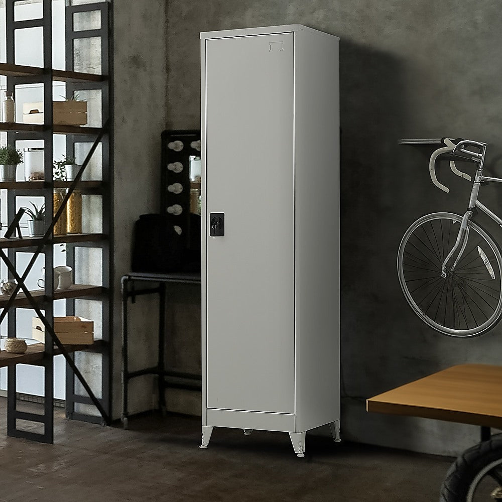 Tall metal storage cabinet with single closed door and floor-level legs.