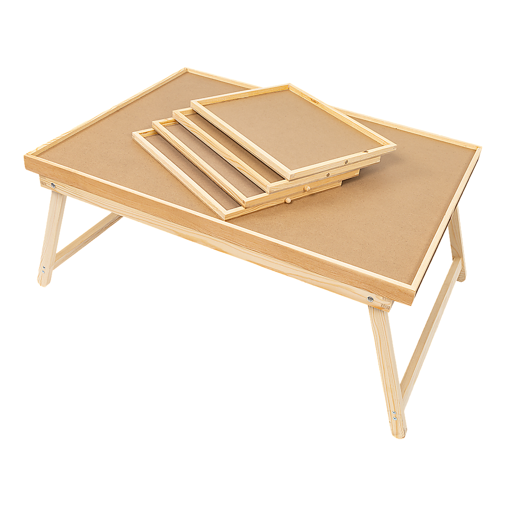 Wooden puzzle table with folding legs and a raised tray frame on the board