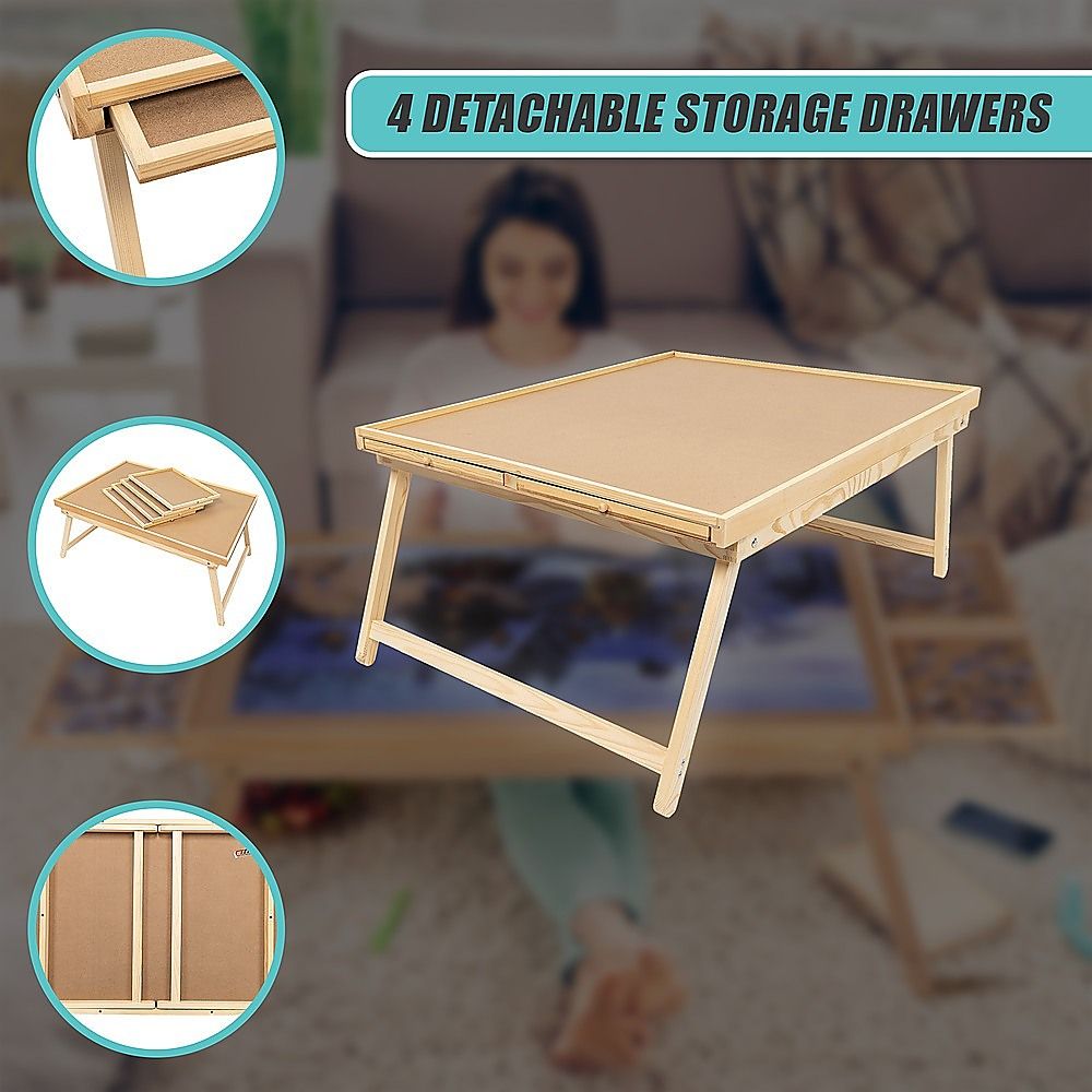 Light wood puzzle table with tabletop storage drawers and foldable support legs