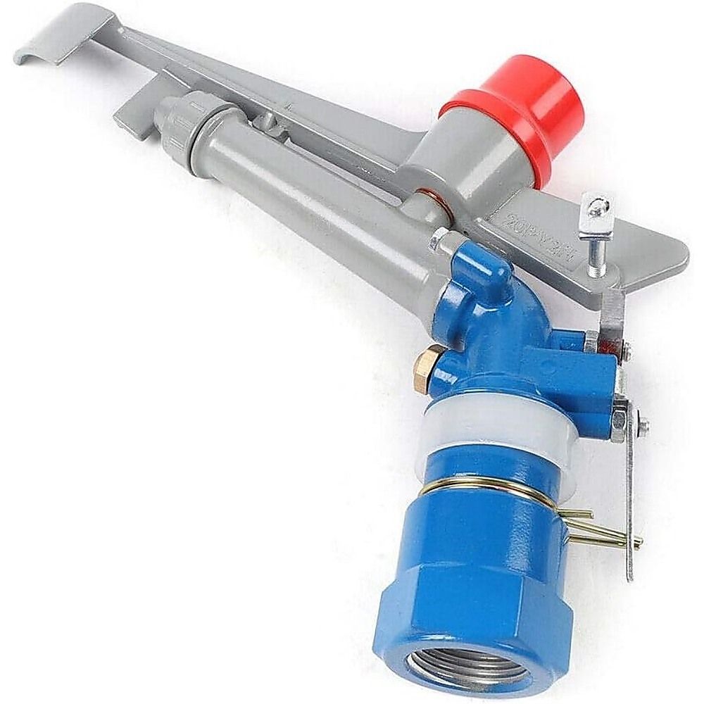 Close-up of 360-degree impact sprinkler head with red cap and gray spray arm