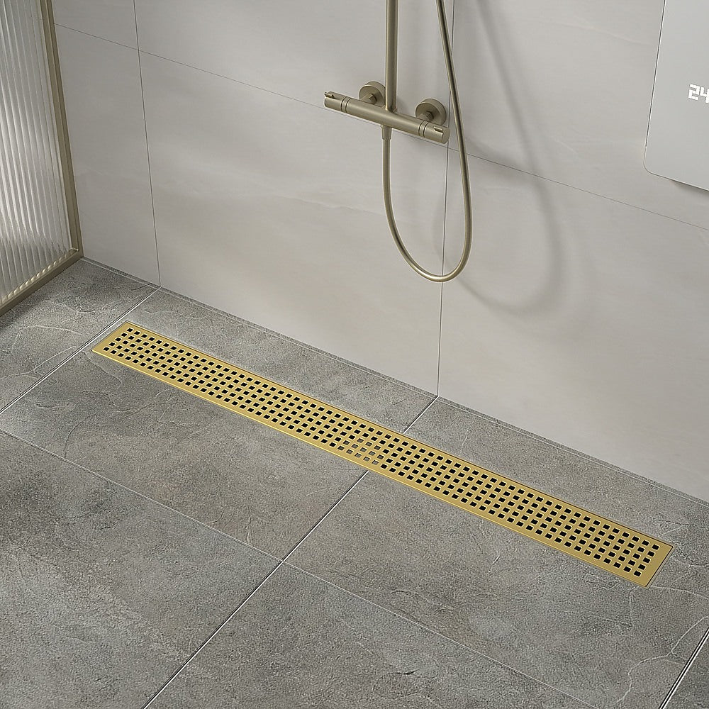 800mm linear shower floor drain grate with brushed brass finish, center outlet