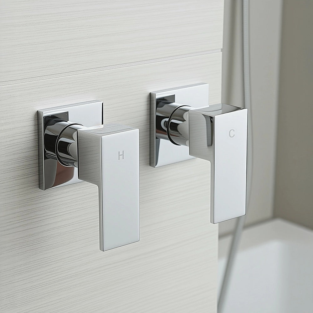 Wall-mounted square chrome shower mixer with H and C control handles