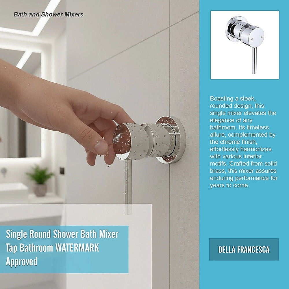 Hand operating a chrome shower bath mixer tap on a bathroom wall