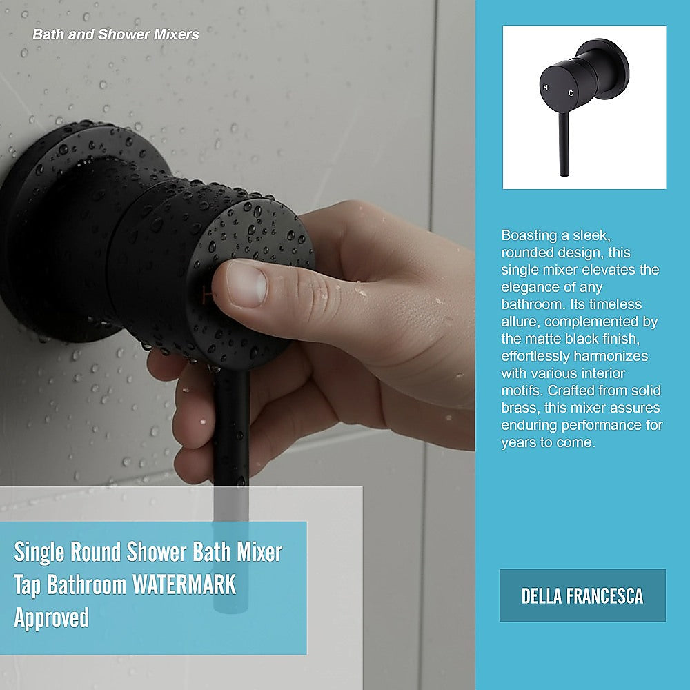Matte black shower bath mixer tap held by a hand with water droplets on handle