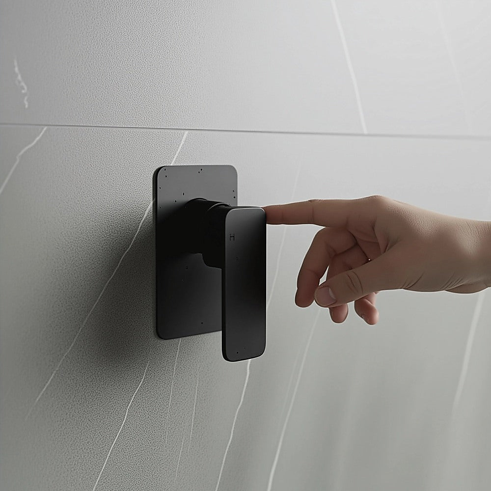 Black shower mixer tap with square plate and lever handle, wall-mounted