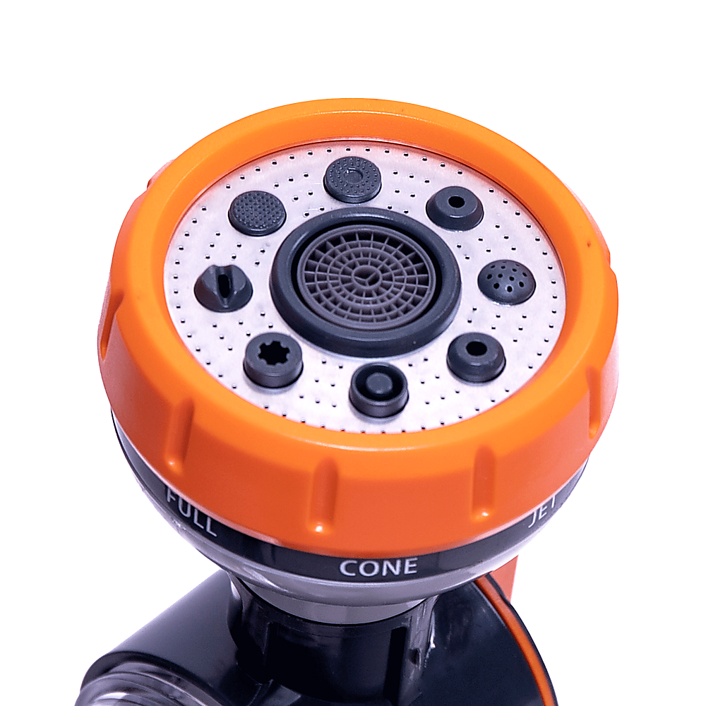 Close-up of garden hose nozzle sprayer head with orange cover and multi-hole jet face
