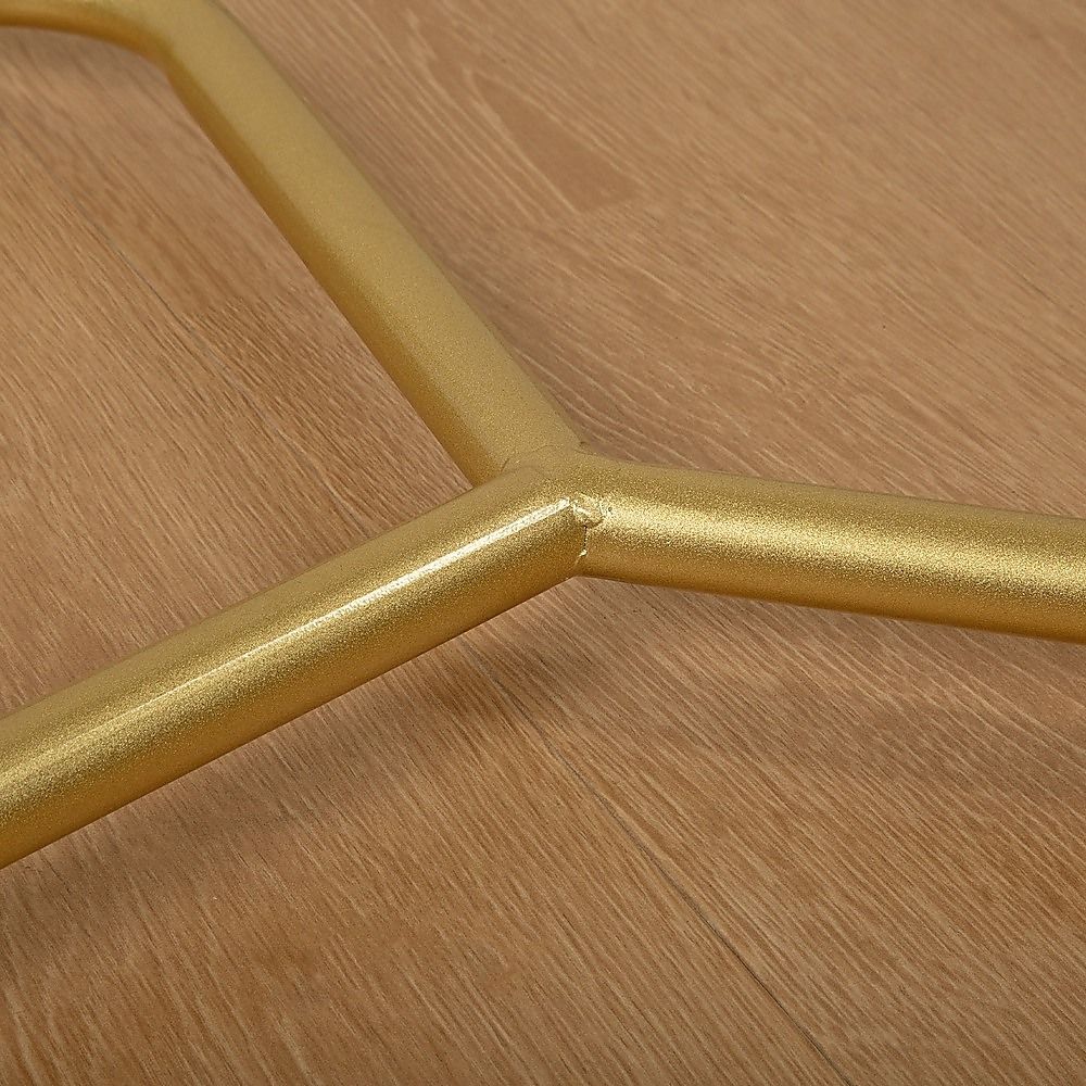 Gold metal rack tube corner with rounded junction and textured finish