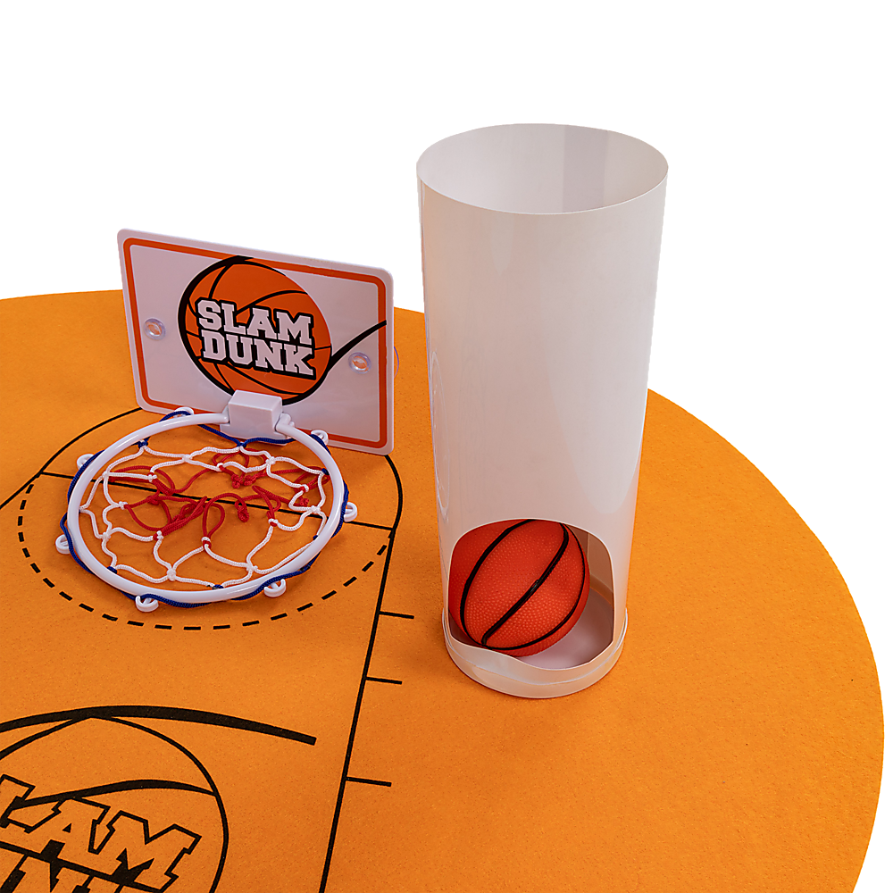Orange court mat with basketball and white scoring tube beside a small hoop