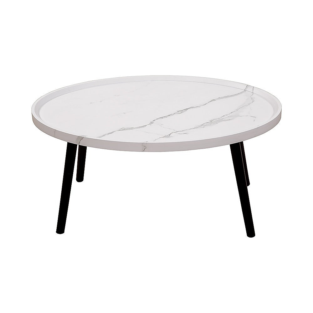 Oval marble-look coffee table with white top and dark tapered wooden legs