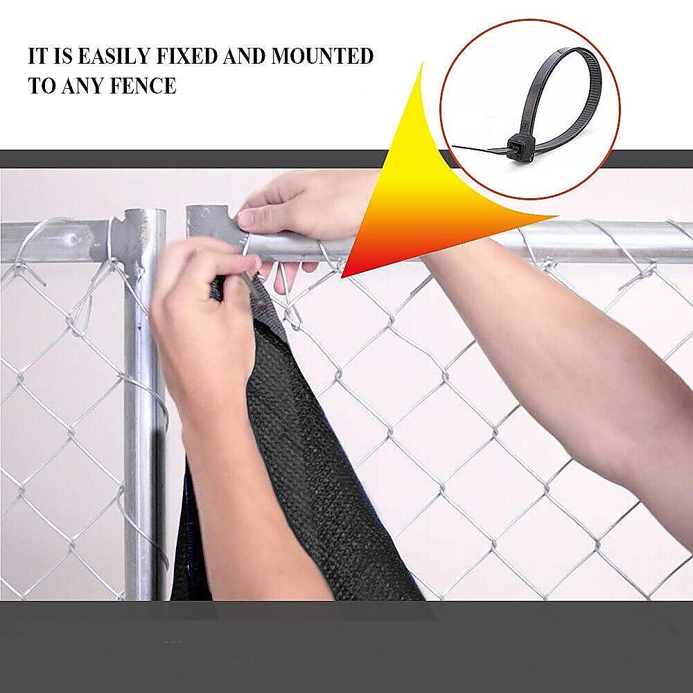 Black mesh privacy screen sheet with reinforced grommets for fence mounting