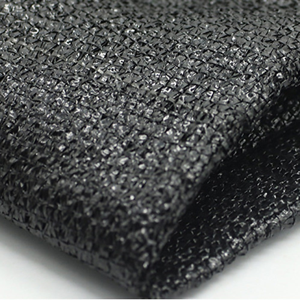 Black mesh fabric privacy screen, textured woven surface close-up