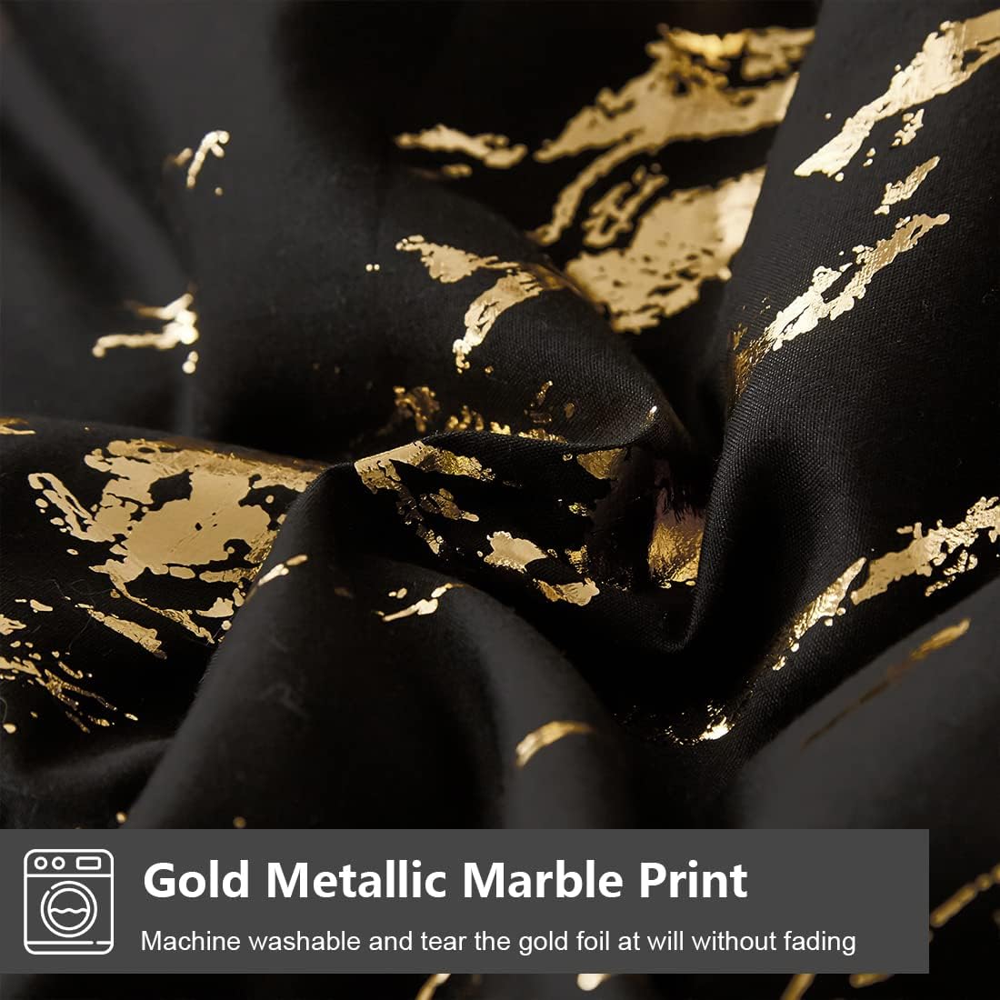 Black fabric close-up with gold metallic marble foil print
