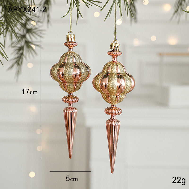 Gold and rose gold hanging ornament pair, dome bauble with narrow ribbed spike bottom