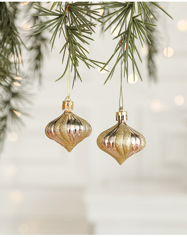 Christmas ornaments set: two gold and rose gold glitter baubles with hanging loops