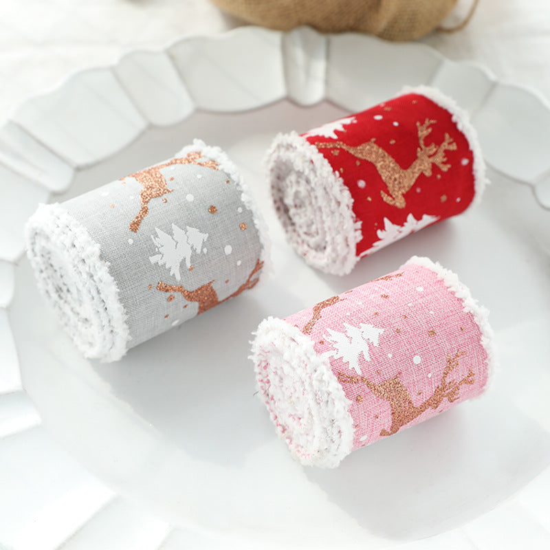 Christmas decorative wired ribbon roll, gray with gold reindeer and tree motifs
