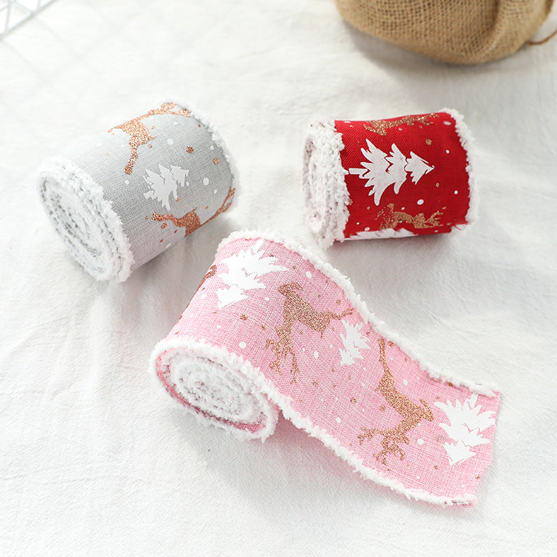 Christmas decorative wired ribbon rolls: gray and red with reindeer and tree motifs