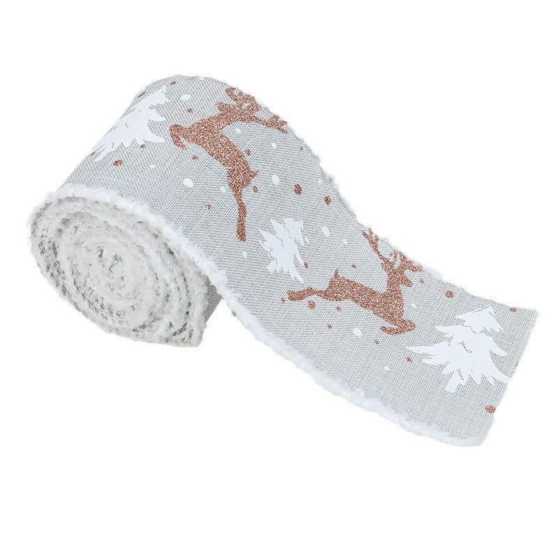 Christmas decorative wired ribbon roll in light gray with tan reindeer and tree motifs