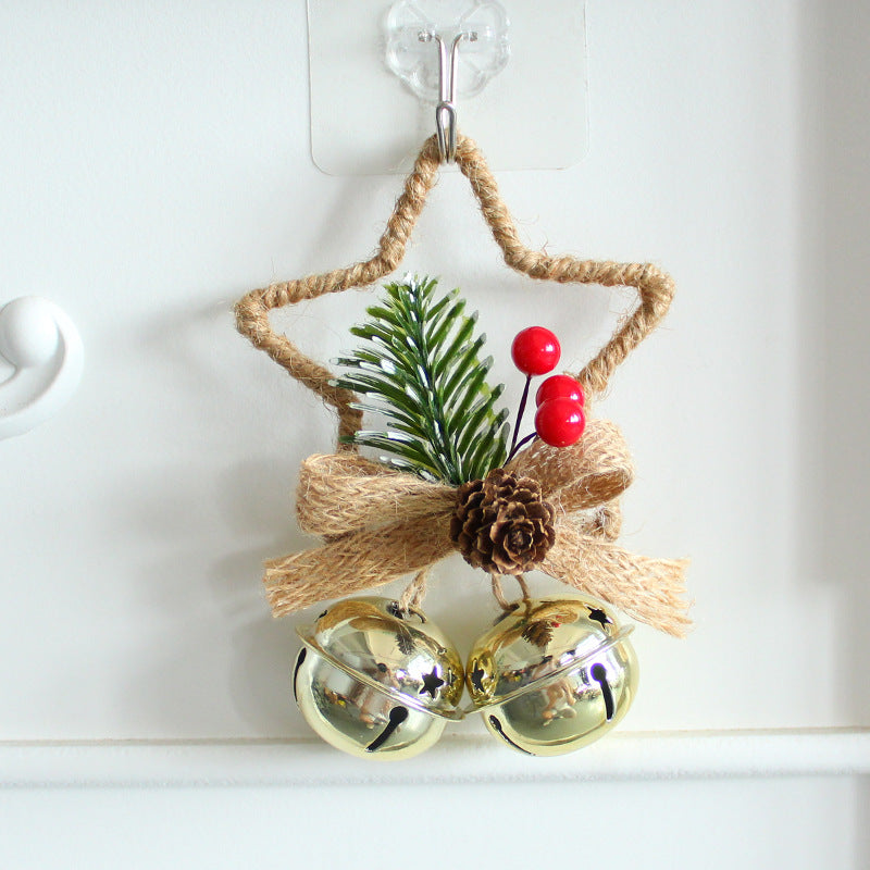 Rustic Christmas star ornament with pine sprig, pinecone, red berries, and gold bells
