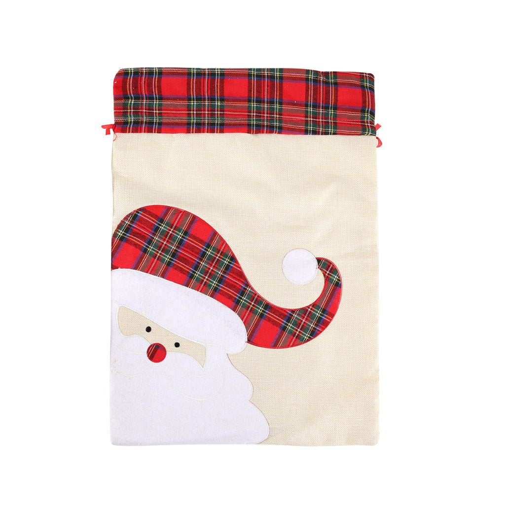 Santa Claus drawstring gift bag, cream pouch with red tartan plaid top and Santa applique