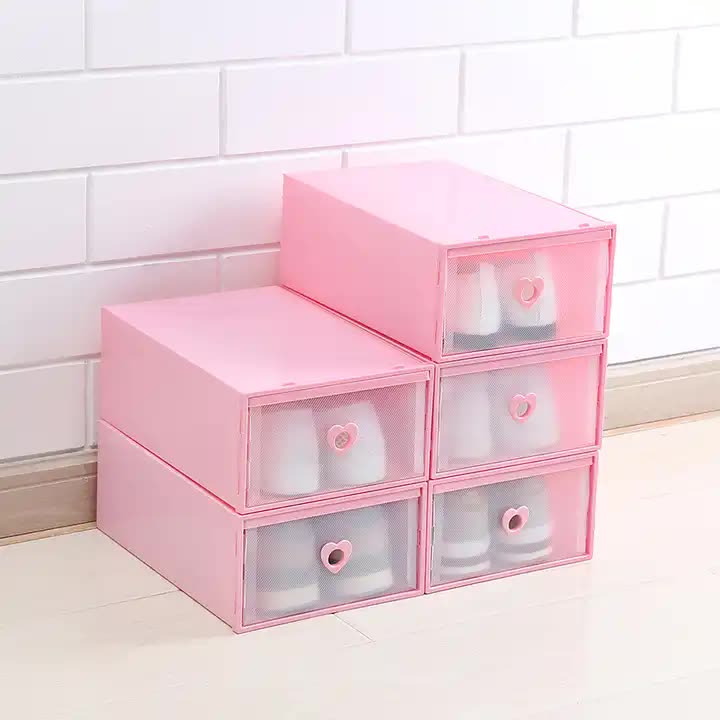 Stackable transparent shoe storage boxes with pink drawers and heart-shaped handles
