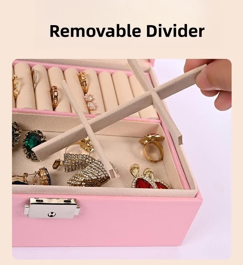 Pink jewelry organizer box with removable divider, ring slots and ring display sections