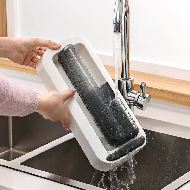 Grey covered utensil holder with dustproof bin, countertop use with water splashes