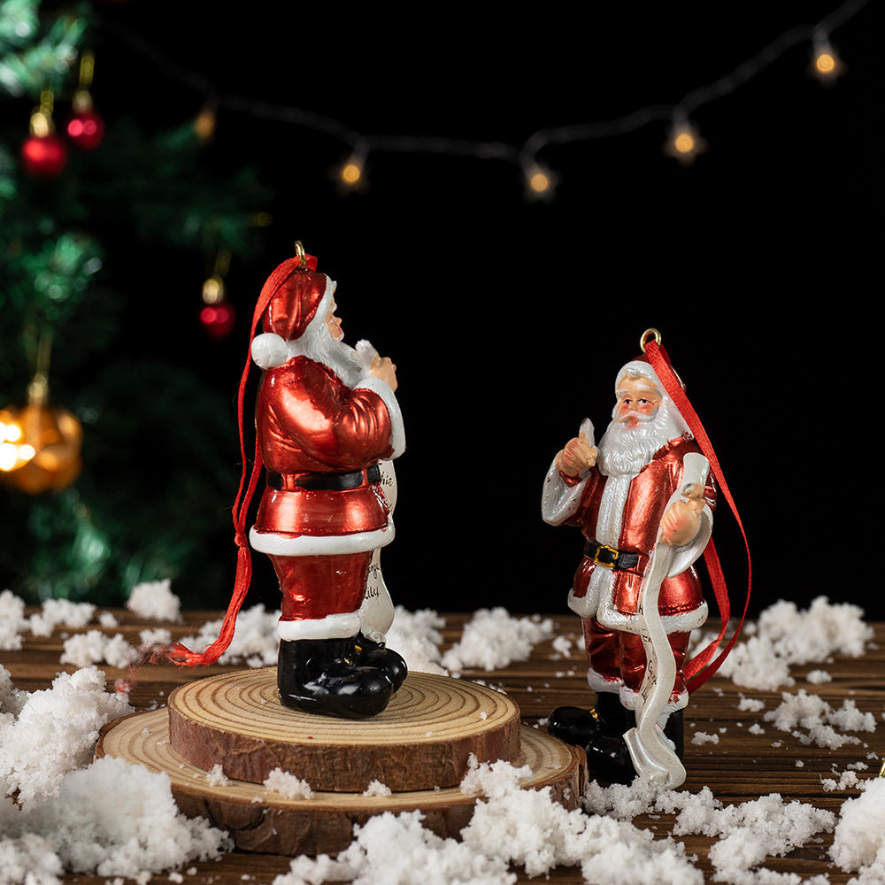 Santa Claus resin ornament figurine with red hanging loop, white beard, holding name list scroll