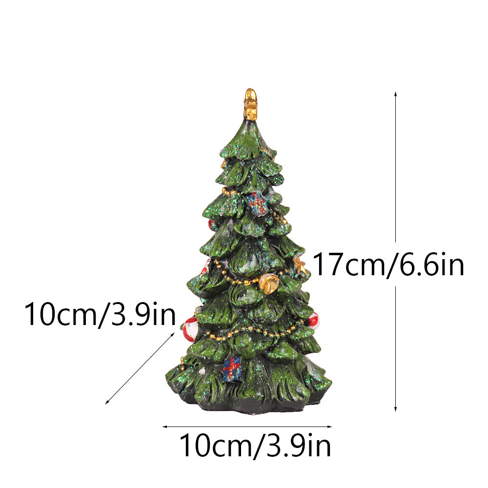 Green resin Christmas tree figurine, 10cm wide and 17cm tall, gold topper